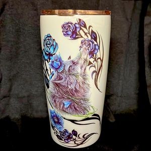 20 is double walled tumbler. Blue roses/wolf